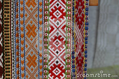 Traditional Latvian belts are belts are made with yarn, precious artefacts, variety of colors, different in Latvian regions. Stock Photo