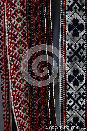 Traditional Latvian belts are belts are made with yarn, precious artefacts, variety of colors, different in Latvian regions. Stock Photo