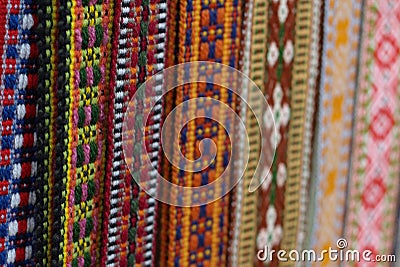 Traditional Latvian belts are belts are made with yarn, precious artefacts, variety of colors, different in Latvian regions. Stock Photo