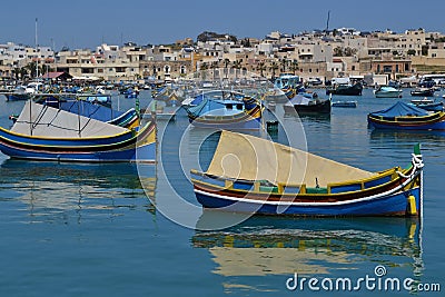 Traditional luzzu boats in Malta Stock Photo