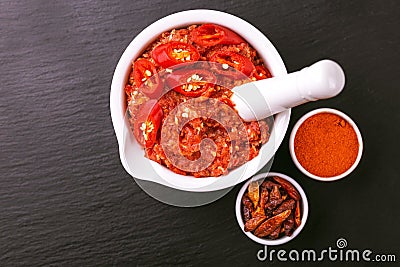 Traditional Maghrebi hot chili pepper sauce paste harissa. adjika Stock Photo