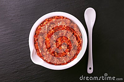 Traditional Maghrebi hot chili pepper sauce paste harissa. adjika Stock Photo