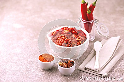 Traditional Maghrebi hot chili pepper sauce paste harissa. adjika Stock Photo