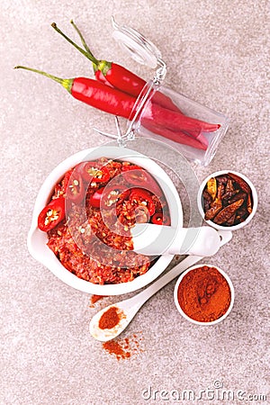 Traditional Maghrebi hot chili pepper sauce paste harissa. adjika Stock Photo