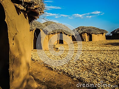 Traditional massai hut made of earth and wood Stock Photo