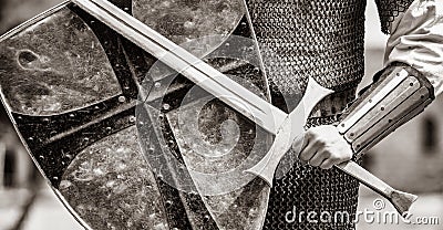 Traditional medieval knight with shield and sword Stock Photo