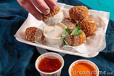 Traditional Mediterranean Arabic vegan falafel balls with a variety of dips Stock Photo