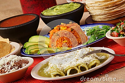 Traditional mexican green enchilada dinner Stock Photo