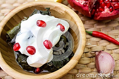 Traditional middle eastern dish dolma. Grape leaves stuffed with rice and meat Stock Photo