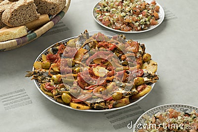 Traditional Moroccan dish with sardines and vegetables Stock Photo