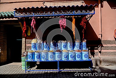 Traditional Moroccan oriental spices and dried herbs in colorful bags for sale in Marrakech Editorial Stock Photo