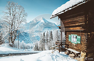 Traditional mountain cabin in the Alps in winter Stock Photo