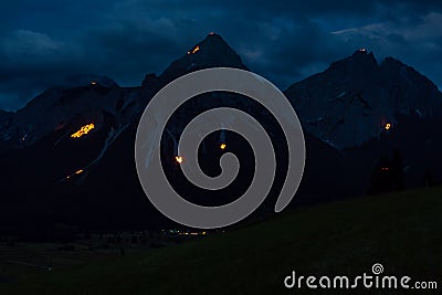 Traditional mountain fire and solstice fire near Ehrwald Stock Photo