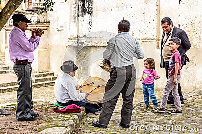 Traditional musicians play to onlookers, Guatemala Editorial Stock Photo