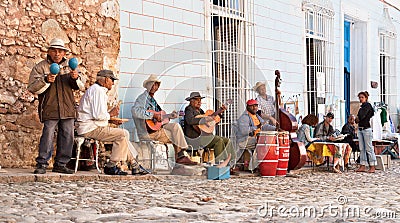 Traditional musicians playing in the streets in Trinidad, Cuba. Editorial Stock Photo