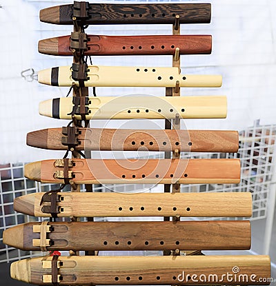 Traditional Native American Indian flutes on display for sale at a powwow, San Francisco Stock Photo