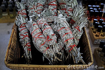 Traditional Native American Indian ritual white sage smudge sticks for sale at a powwow, San Francisco Stock Photo