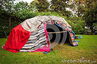Traditional native sweat lodge with hot stones Stock Photo
