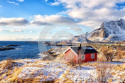 Traditional norwegian fishing houses rorbu on the Lofoten Islands, Hamnoy, Norway. Amazing winter landscape Stock Photo