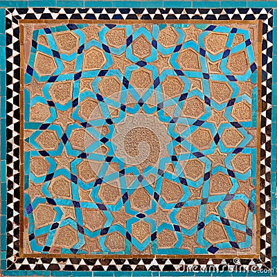 Traditional Old Islamic Design made of Brown Clay and Blue Tiles in Yazd Stock Photo