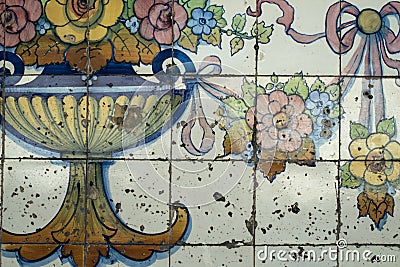 Traditional old tiles wall on the street Portuguese painted tin-glazed, azulejos ceramic tile-work. Stock Photo