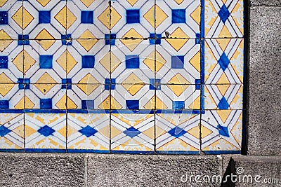 Traditional old tiles wall on the street Portuguese painted tin-glazed Stock Photo