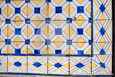 Traditional old tiles wall on the street Portuguese painted tin-glazed Stock Photo