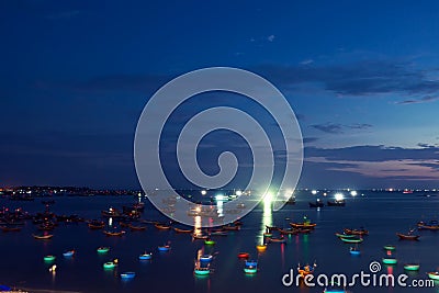 Traditional old wooden Vietnamese boats and round fishing boats Stock Photo