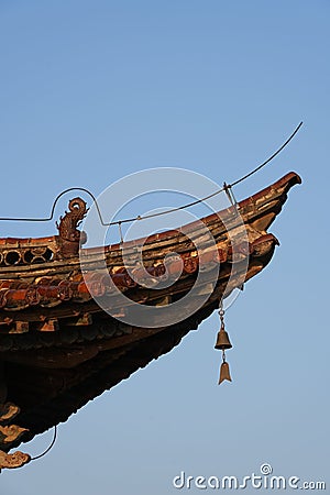 Traditional ornamentation of a Chinese temple roof. Stock Photo