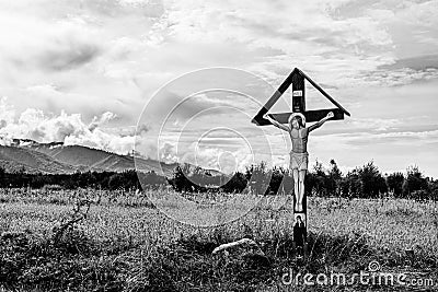 Cross on the side of the road Stock Photo