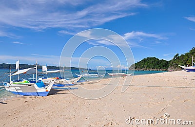 Traditional paraw sailing boat on white beach Stock Photo