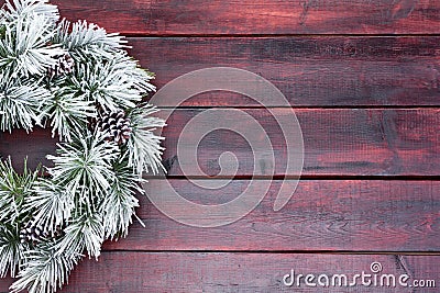 Traditional pine Christmas wreath frosted in snow Stock Photo