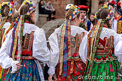 Traditional Polish Folk Costumes on parade in Krakow Main Market Square Editorial Stock Photo