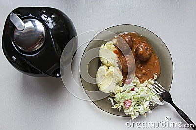 Traditional Polish meatballs with potatoes and salad Stock Photo