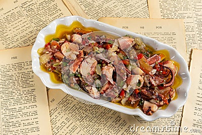 Traditional Portuguese octopus salad, a flavorful delicacy served in Portuguese restaurants. Stock Photo