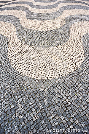 Traditional Portuguese pavement cobblestone - Lisbon Stock Photo