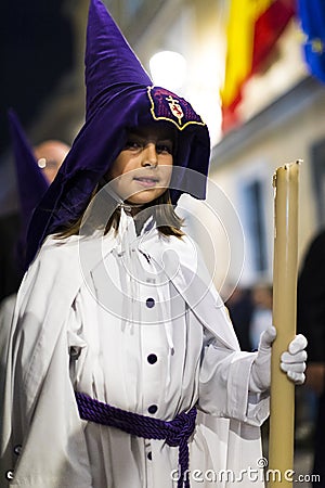 The traditional profession of religious Catholic orders during the Holy Week of the course of sinners along the streets of Madrid. Editorial Stock Photo