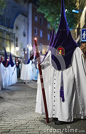 The traditional profession of religious Catholic orders during the Holy Week of the course of sinners along the streets of Madrid. Editorial Stock Photo