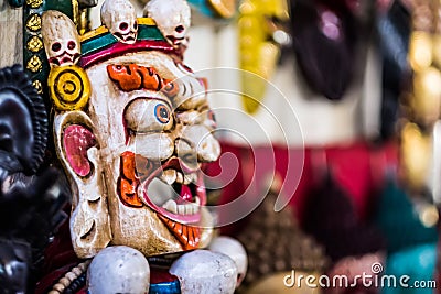 Bhairav mask hanging at the market in Nepal Stock Photo