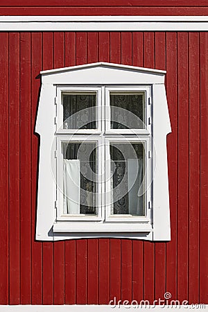 Traditional red wooden house facade in Rauma town. Finland heritage. Stock Photo