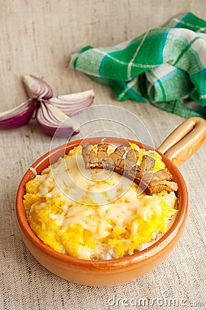 Traditional Romanian dish with corn mush and chees Stock Photo