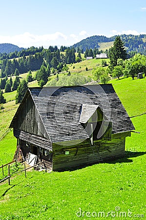 Traditional romanian rural barn Fundata Stock Photo