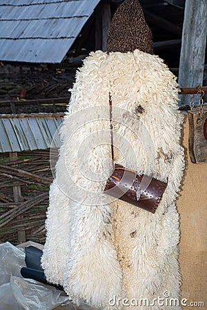 Traditional Romanian sheepskin coat for shepherd man during traditional country fair Editorial Stock Photo