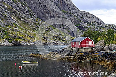 Traditional rorbu in Nusfjord settlement, Lofoten islands. Stock Photo