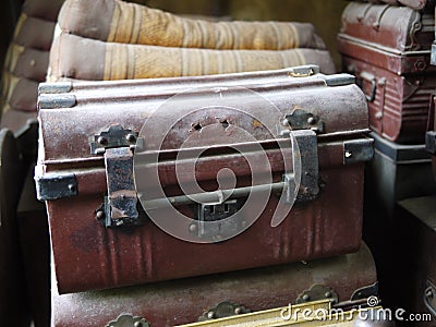Traditional royal coffer with dark red brown and black metal finishing, over decades using asset. Stock Photo
