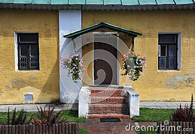 Traditional Russian Cottage with Flowers Stock Photo