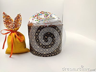 Traditional Russian Orthodox Easter bread-kulich and Easter hare. A small Easter cake with the traditional Russian inscription `XB Editorial Stock Photo