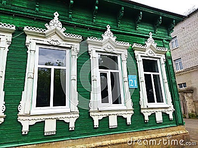 Hand carved windows of old wooden house in Rybinsk, Yaroslavl region, Russia. Editorial Stock Photo
