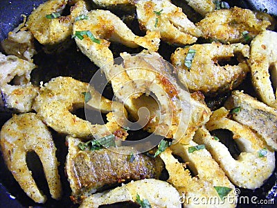 Traditional rustic Slave cuisine of Belarus russian cuisine : fillet of pike fish fried on pan close up Stock Photo