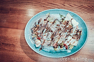 Traditional Salad with big Portion on table Stock Photo